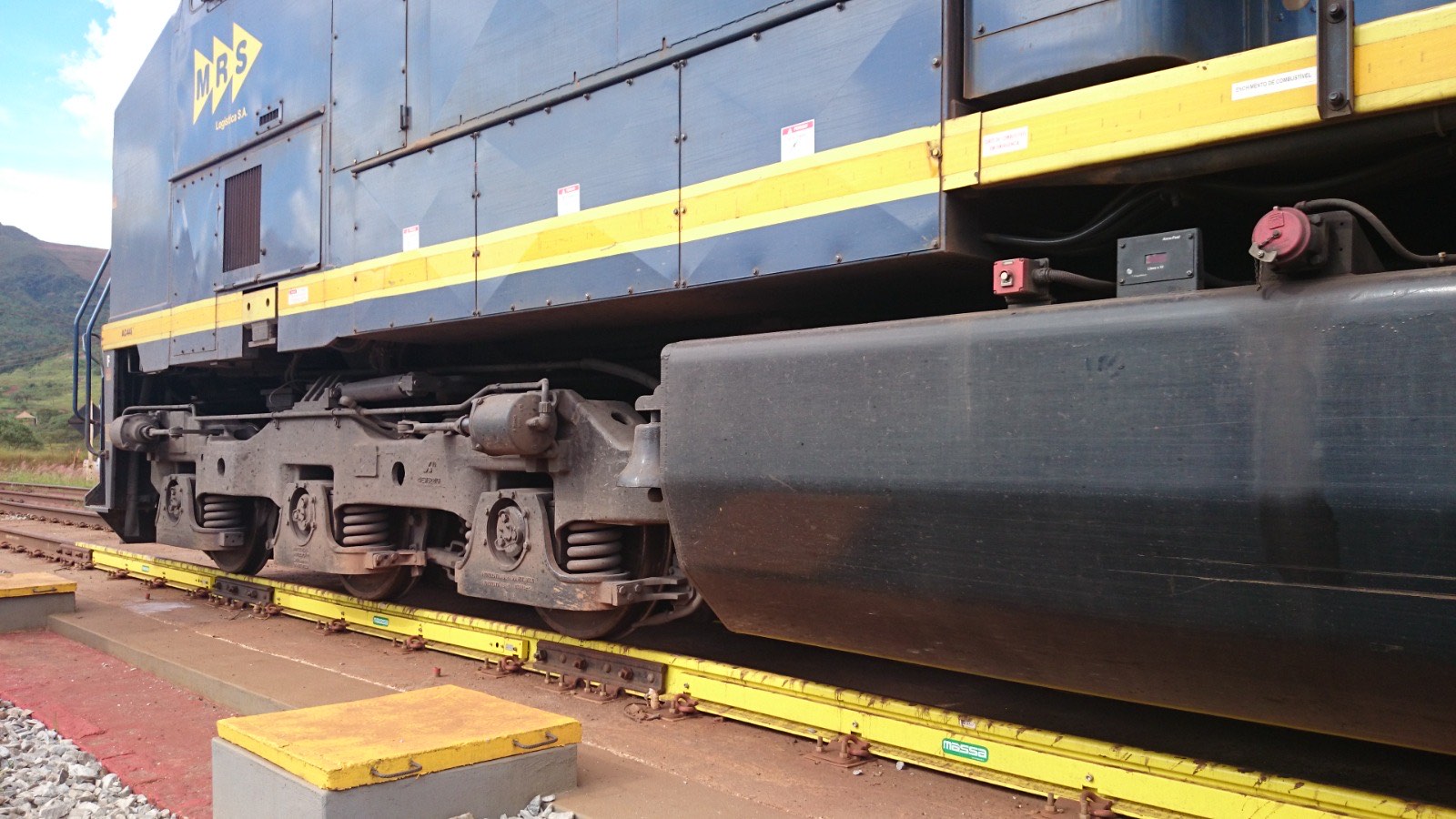 Detalle del bogie del vagón sobre la báscula
